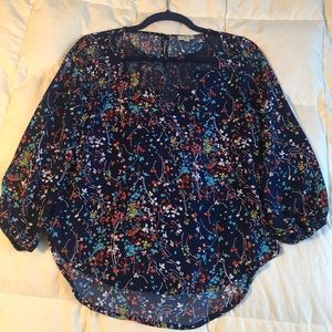 Floral blouse with mesh neckline